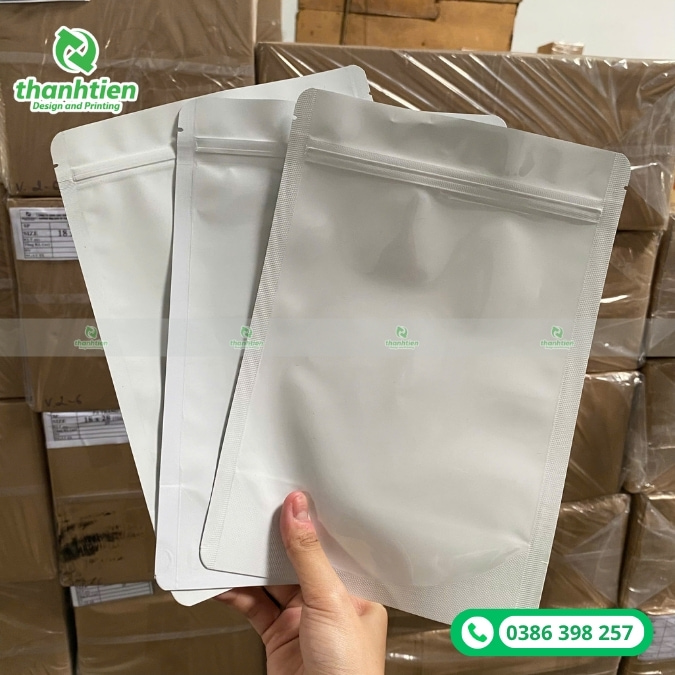 t&uacute;i zipper 2 mặt sữa